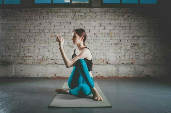 girl stretching in yoga pose stock photo image